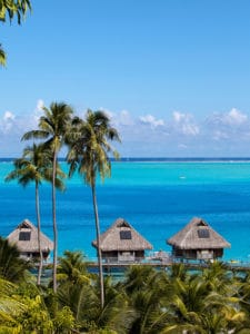 French Polynesia. Over water bungalows and palm trees