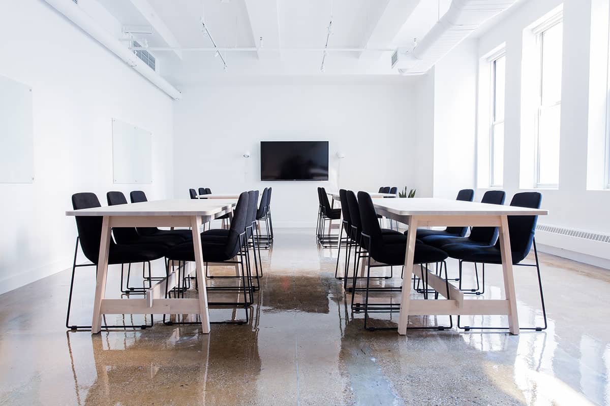 The-Training-Experience-1024x683-1 Training Room with 4 tables and 6 chairs around each table